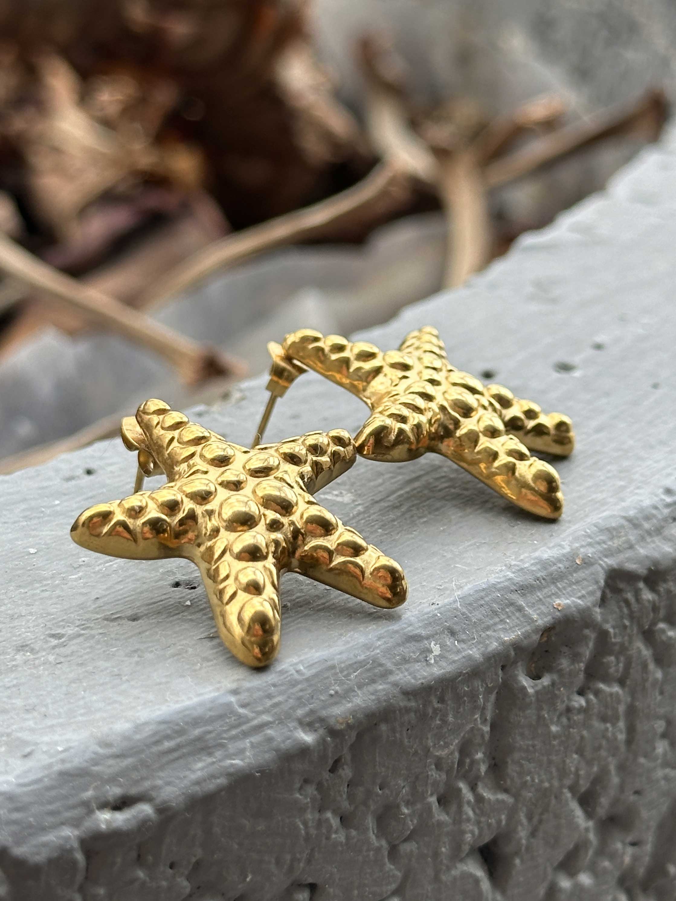 Norla - Guldiga sjöstjärneörhängen